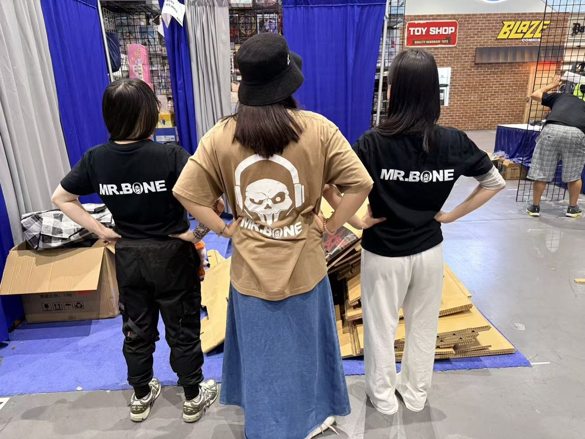 Team in Mr.Bone shirts at the SDCC booth
